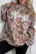 Camouflage-patterned sweatshirt with 'Howdy' text worn by a person against a white background