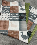 Baby blanket with duck and 'Adventures with Daddy' text on a textured surface