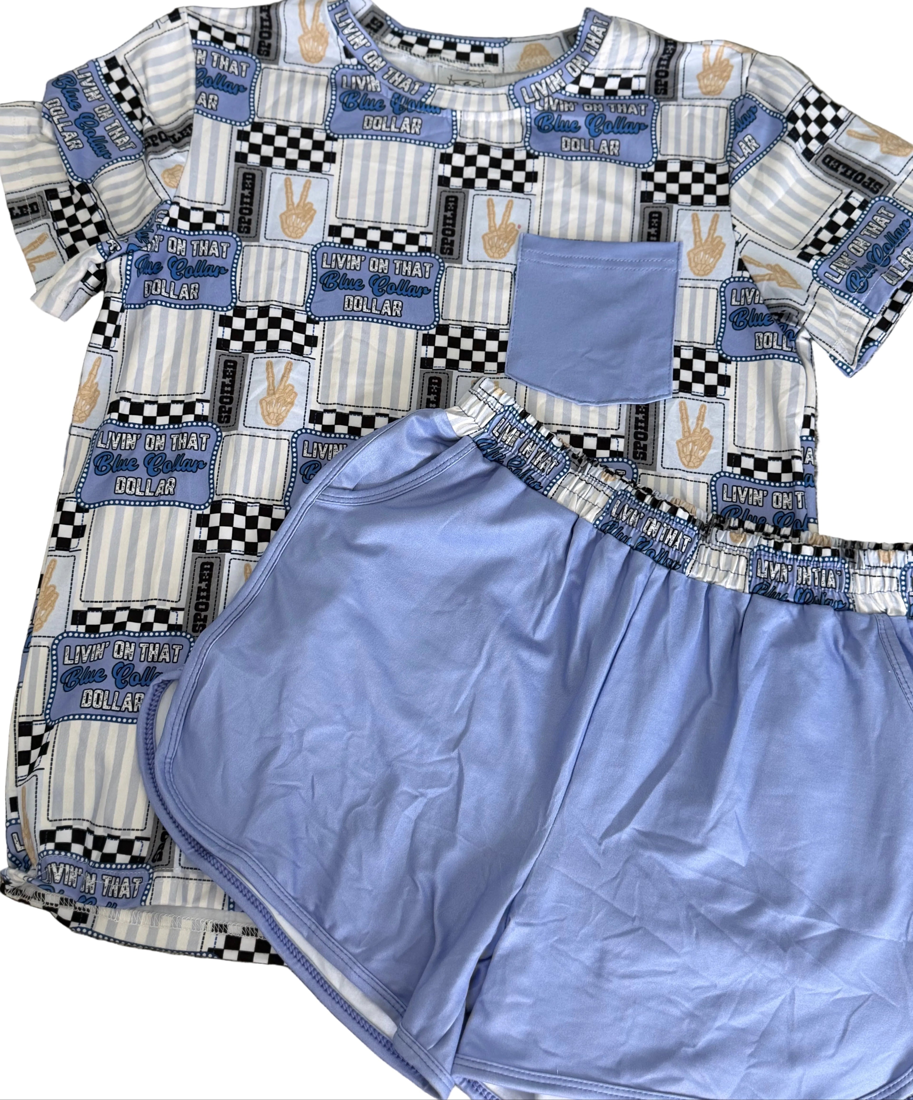 Patchwork shirt and shorts set on a textured surface